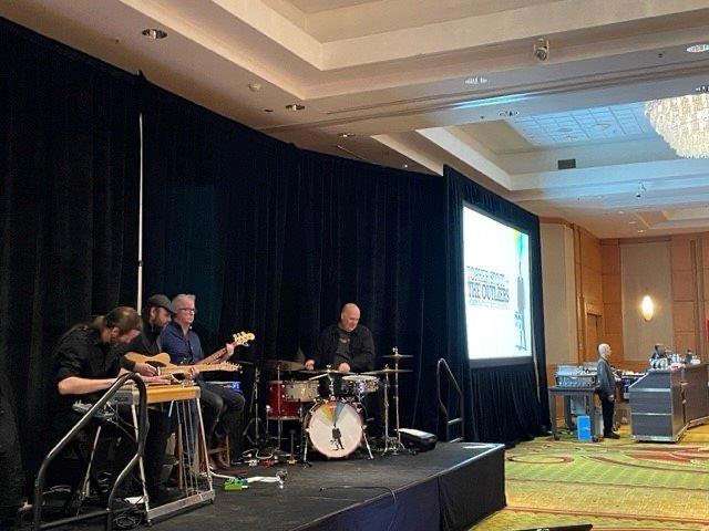 Live band performing at an Exposoft event reception